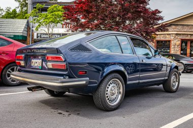 Highlands, NC - June 10, 2022: Low perspective rear corner view of a 1979 Alfa Romeo Sprint Veloce  Hardtop Coupe at a local car show.