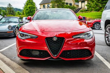 Highlands, NC - June 11, 2022: Low perspective front view of a 2017 Alfa Romeo Giulia Ti Q2 Sedan at a local car show.