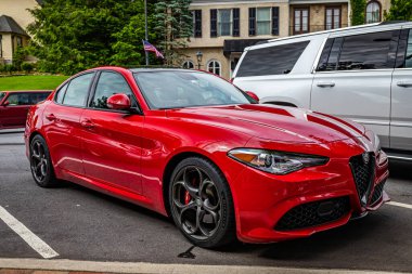 Highlands, NC - June 11, 2022: Low perspective front corner view of a 2017 Alfa Romeo Giulia Ti Q2 Sedan at a local car show.
