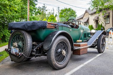 Highlands, NC - June 11, 2022: Low perspective rear corner view of a 1927 Bentley 3 Litre Speed Model Tourer at a local car show.