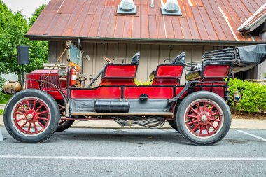 Highlands, NC - June 11, 2022: Low perspective side view of a 1909 Stanley Steamer Model Z at a local car show.