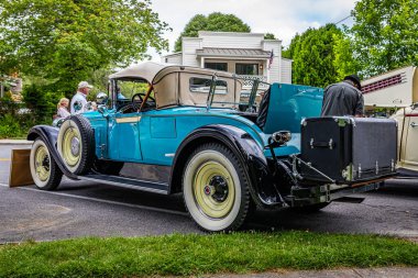 Highlands, NC - June 11, 2022: Low perspective rear corner view of a 1928 Packard Super 8 Roadster at a local car show.