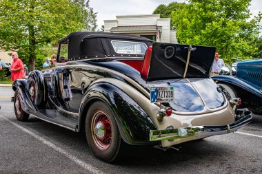 Highlands, NC - June 10, 2022: Low perspective rear corner view of a 1936 Auburn 852 Cabriolet at a local car show.