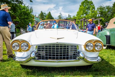 Highlands, NC - June 11, 2022: Low perspective front view of a 1953 Cadillac Elegante Convertible at a local car show.