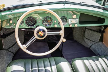Highlands, NC - June 11, 2022: High perspective front interior view of a 1952 Porsche Type 540 America Roadster at a local car show.