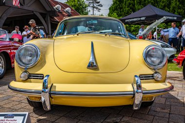 Highlands, NC - June 11, 2022: Low perspective front view of a 1962 Porsche 356B T6  Hardtop Coupe at a local car show.