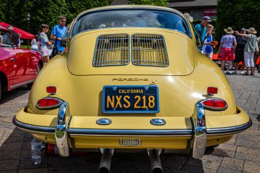 Highlands, NC - June 11, 2022: Low perspective rear view of a 1962 Porsche 356B T6  Hardtop Coupe at a local car show.