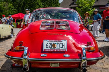 Highlands, NC - June 11, 2022: Low perspective rear view of a 1962 Porsche T6B Notchback Coupe at a local car show.