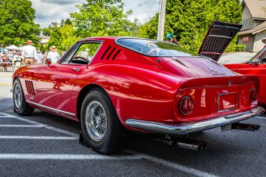 Highlands, NC - June 11, 2022: Low perspective rear corner view of a 1967 Ferrari 275 GTB/4 Coupe at a local car show.