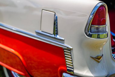 Statesboro, GA - May 17, 2014: Shallow depth of field closeup of the taillight assembly detail on a 1955 Chevrolet BelAir.
