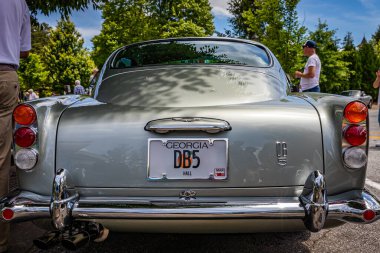Highlands, NC - June 11, 2022: Low perspective rear view of a 1965 Aston Martin DB5 Hardtop Coupe at a local car show.