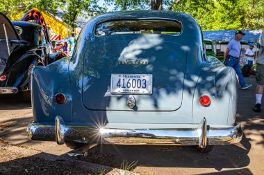 Falcon Heights, MN - June 17, 2022: Low perspective rear view of a 1952 Sears Allstate Hardtop Coupe at a local car show.