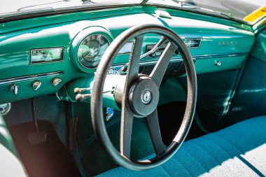 Falcon Heights, MN - June 17, 2022: High perspective detail interior view of a 1940 Dodge Meadowbrook Hardtop Sedan at a local car show.