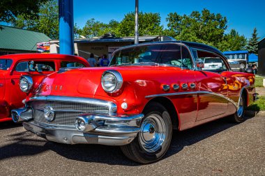Falcon Heights, MN - June 17, 2022: Low perspective front corner view of a 1956 Buick 60 Century 2 Door Hardtop at a local car show.