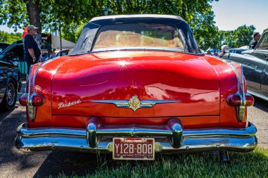 Falcon Heights, MN - June 17, 2022: High perspective rear view of a 1954 Packard Pacific Convertible Coupe at a local car show.