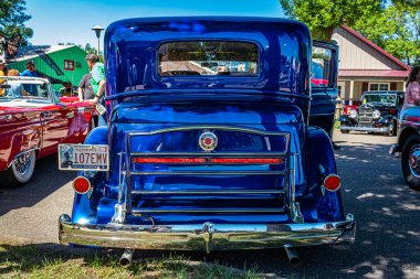 Falcon Heights, MN - June 17, 2022: High perspective rear view of a 1934 Packard Super Eight Club Hardtop Sedan at a local car show.