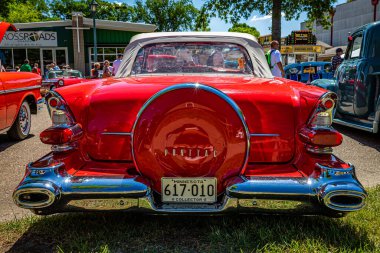 Falcon Heights, MN - June 17, 2022: High perspective rear view of a 1957 Pontiac Star Chief Convertible at a local car show.