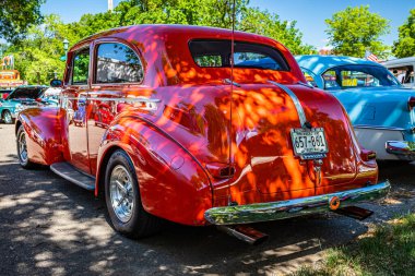 Falcon Heights, MN - June 17, 2022: Low perspective rear corner view of a 1940 Pontiac Special Six Two Door Sedan at a local car show.