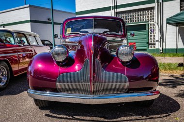 Falcon Heights, MN - June 17, 2022: Low perspective front view of a 1939 Buick 46S Sports Coupe at a local car show.