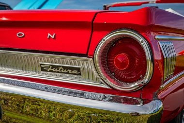 Daytona Beach, FL - November 24, 2018: Taillight detail view of a 1964 Ford Falcon Futura Convertible at a local car show.