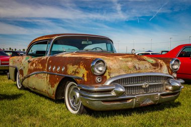 Daytona Beach, FL - November 24, 2018: Low perspective front corner view of a 1955 Buick Century Hardtop Coupe at a local car show.