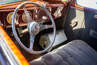 Falcon Heights, MN - June 17, 2022: High perspective detail interior view of a 1938 Ford V8 Deluxe Coupe  at a local car show.