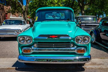 Falcon Heights, MN - June 17, 2022: High perspective front view of a1959 Chevrolet Apache 3100 Stepside Pickup Truck at a local car show.