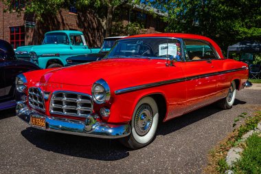 Falcon Heights, MN - June 17, 2022: Low perspective front corner view of a 1955 Chrysler C300 2 Door Hardtop Coupe at a local car show.