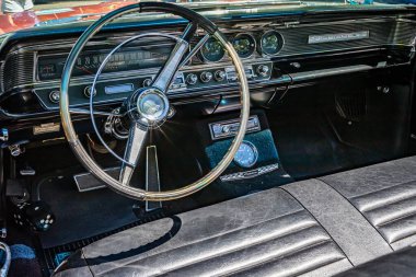 Falcon Heights, MN - June 17, 2022: Close up detail interior view of a 1964 Pontiac Catalina Convertible at a local car show.