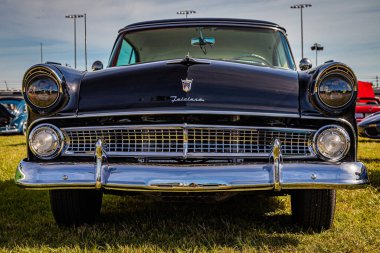 Daytona Beach, FL - November 24, 2018: Low perspective front view of a 1955 Ford Fairlane Victoria Hardtop Coupe at a local car show.