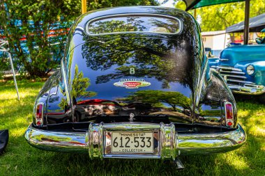 Falcon Heights, MN - June 17, 2022: High perspective rear view of a 1948 Oldsmobile Dynamic Cruiser 78 Sedan at a local car show.