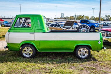 Daytona Beach, FL - November 24, 2018: Side view of a 1964 Mercury Econoline Pickup Truck at a local car show.