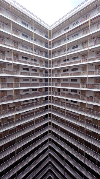The Hong Kong housing problem old appartment estate building in downtown in perspective view angle