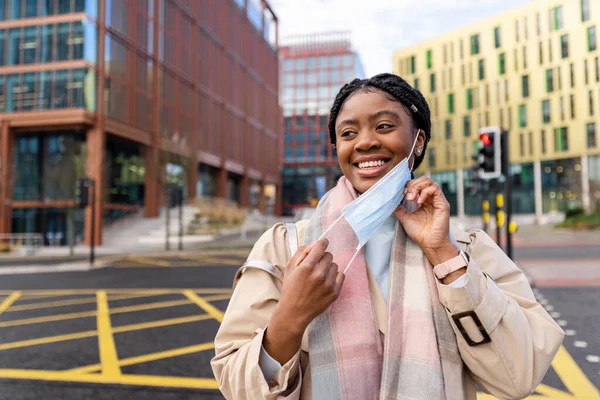 Cheerful Woman City Centre Taking Face Covering Smiling Looking Away — Stock Photo, Image