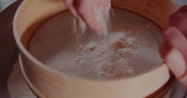 Sifting flour in Strainer. Woman Preparing Ingredients for baking croissants. — Vídeos de Stock