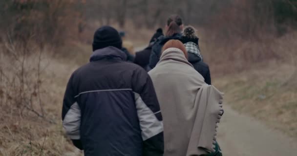 War Refugees With Luggage Walking On Road. — Stock Video