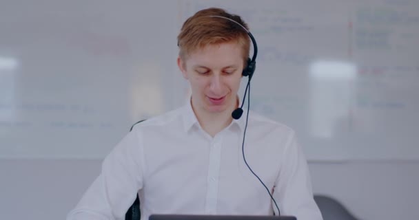 Young Man Doing Video Meeting Using Headset Talking Businessman Working — Stockvideo