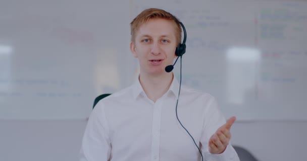 Young Man Doing Video Meeting Using Headset Talking Businessman Working — Vídeo de stock