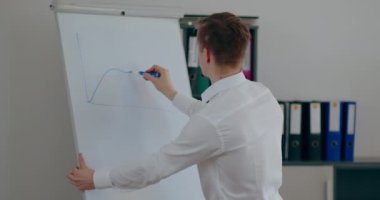 Businessman Writing on Clipboard on Business Meeting Conference, sales manager writing, working on business strategy.