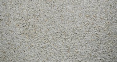 Gri beton duvarın pürüzlü ve gözenekli dokusu, siyah ve beyaz soyut arka plan