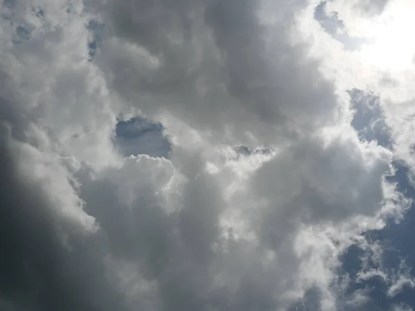 Cumulonimbus cloud formations on tropical sky , Nimbus moving , Abstract background from natural phenomenon and gray clouds hunk , Thailand