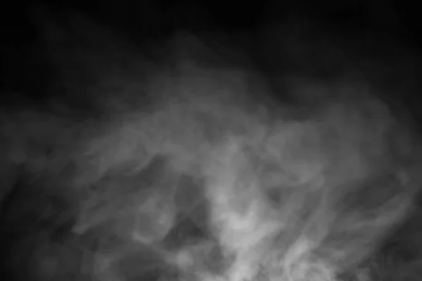 黒い背景に加湿器のついた白い蒸気煙が — ストック写真