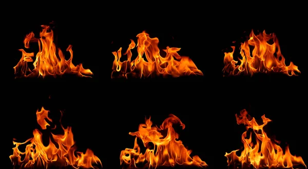 点燃篝火 燃烧燃料夜间从火中提取热能 被隔离在黑色背景下 — 图库照片