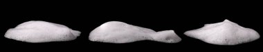 Set liquid white foam from soap or shampoo or shower gel. Abstract bubbles. isolated on a black background
