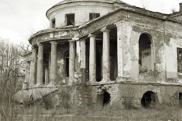 ruined old manor house of the late 19th century with columns. Russia. Penza region. Kamenka Manor of Voyekov, the first Minister of Sports of the Russian Empire. black and white photography