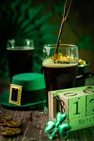 St Particks day concept - beer, pot of gold, calendar, hat — Stock Photo, Image