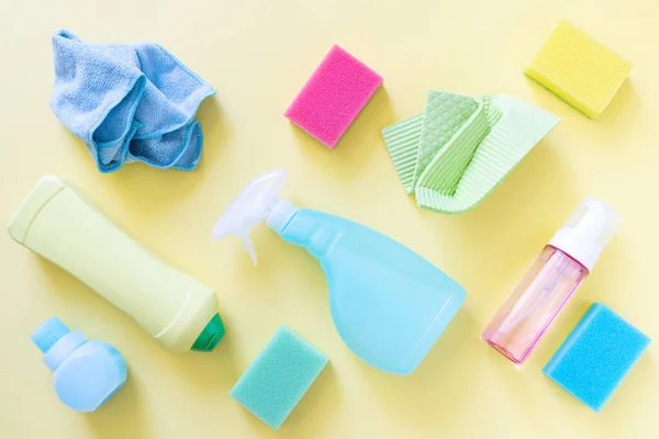 Cleaning Concept Cleaning Supplies Pastel Yellow Background Top View — Stok Foto