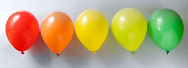 Selection Colorful Balloons Grey Background Top View — Zdjęcie stockowe