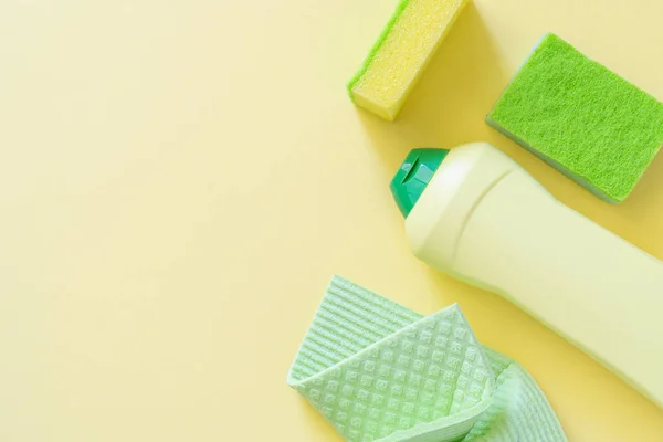Cleaning Concept Cleaning Supplies Pastel Yellow Background Top View — ストック写真