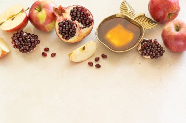 Rosh hashanah concept - honey, pomegranate and apples. High quality photo